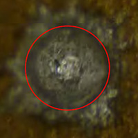 
	Picture of damage discovered on ISS ATA-3, Impact No. 32.
