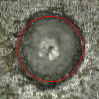 
	Picture of damage discovered on ISS ATA-3, Impact No. 33.
